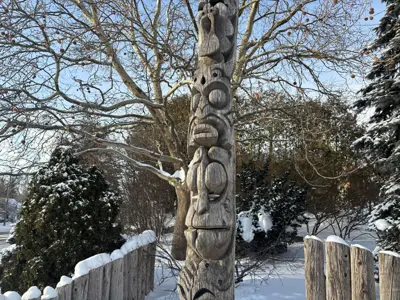Carved wooden totem pole
