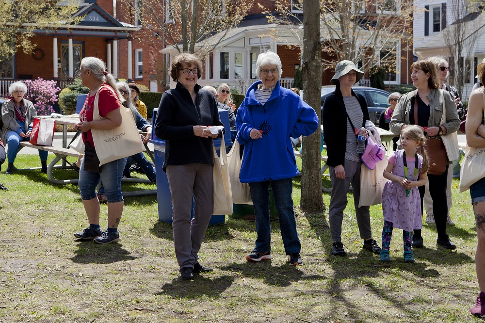 Crowd of people gathered in Florence Carlyle Park